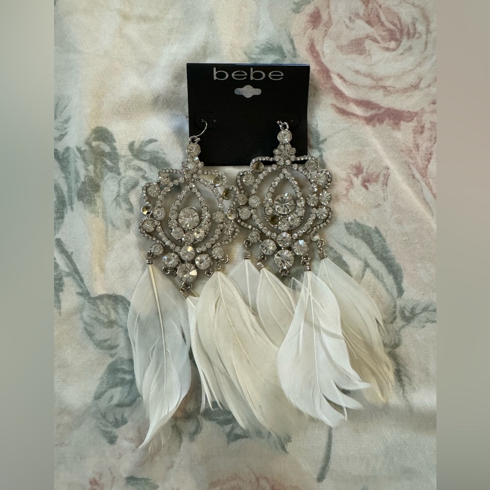 BEBE silver rhinestone and feathers dangle earrings